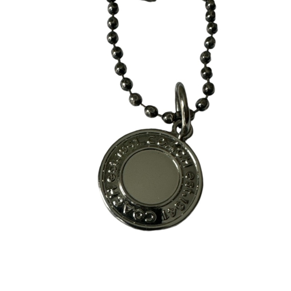 Designer Coach Silver-Tone Embossed Beaded Disc Round hang tag